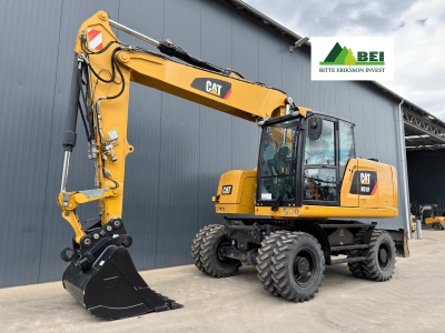 Caterpillar M318F, triple / 1